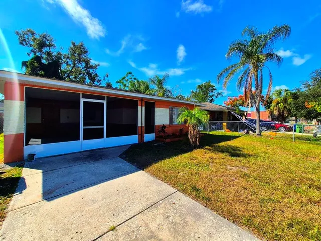 a view of a house with a swimming pool