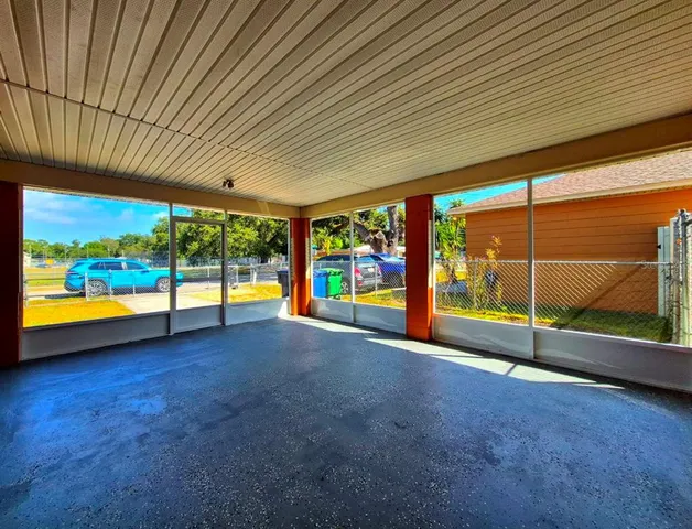 a view of an empty room with a sliding door