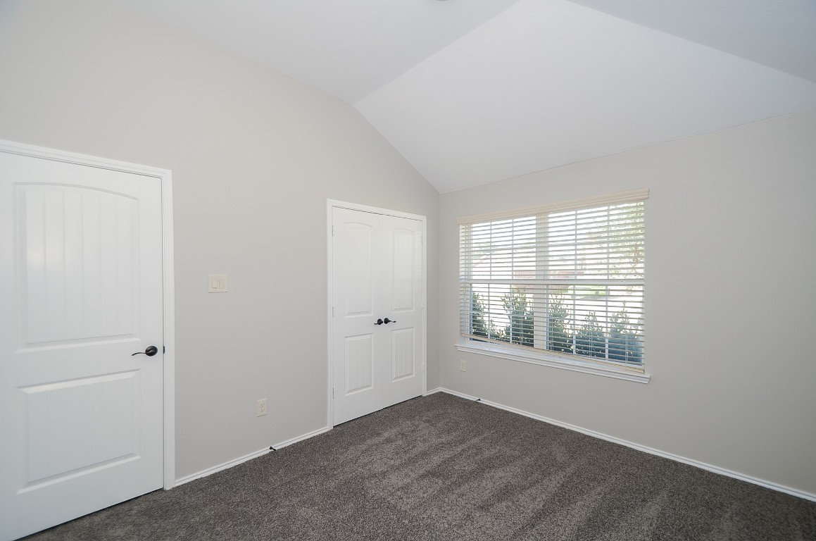 2646 Leopard Court Katy, TX 77449 - Photo 19 of 32 a view of an empty room with a window