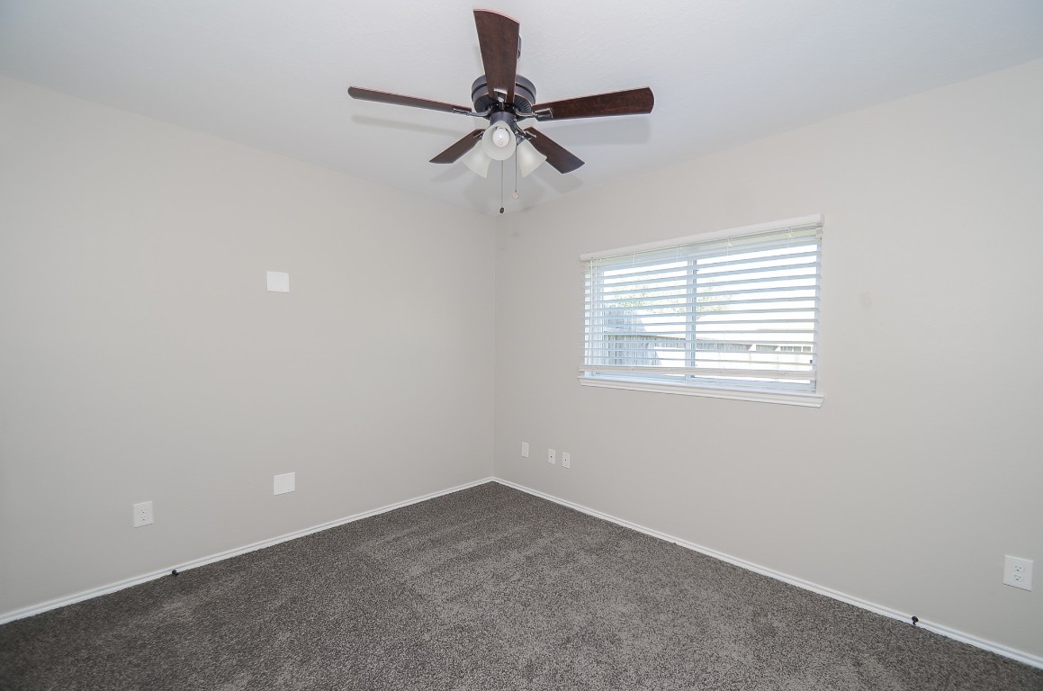 2646 Leopard Court Katy, TX 77449 - Photo 22 of 32 a view of an empty room with a window