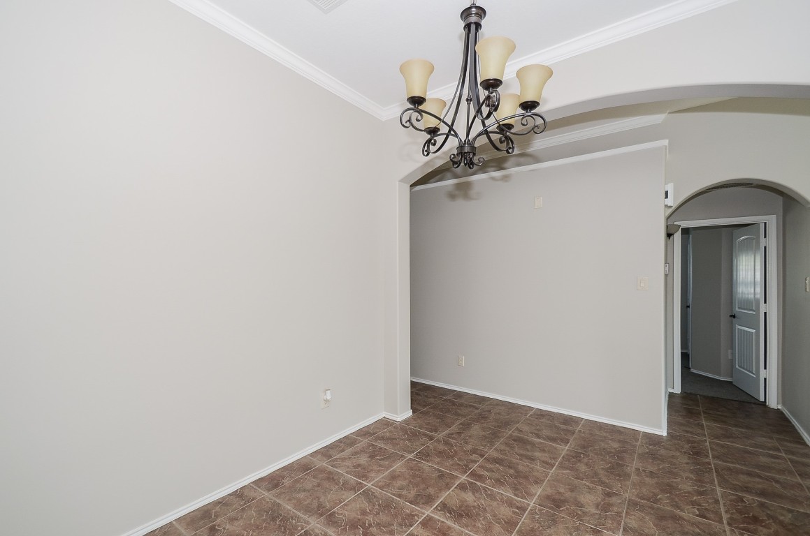 2646 Leopard Court Katy, TX 77449 - Photo 6 of 32 a view of a chandelier in a room