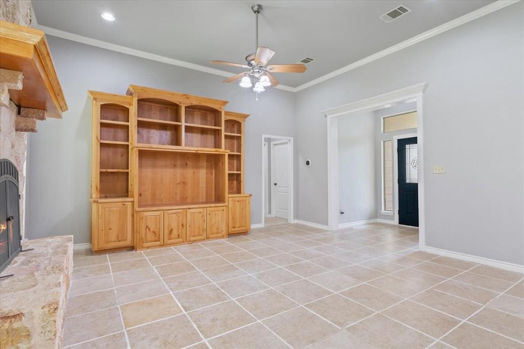 140 Oak Ridge Loop Whitney, TX 76692 - Photo 6 of 40 Inviting living area featuring high vaulted ceilings, light-toned tile flooring, and a ceiling fan