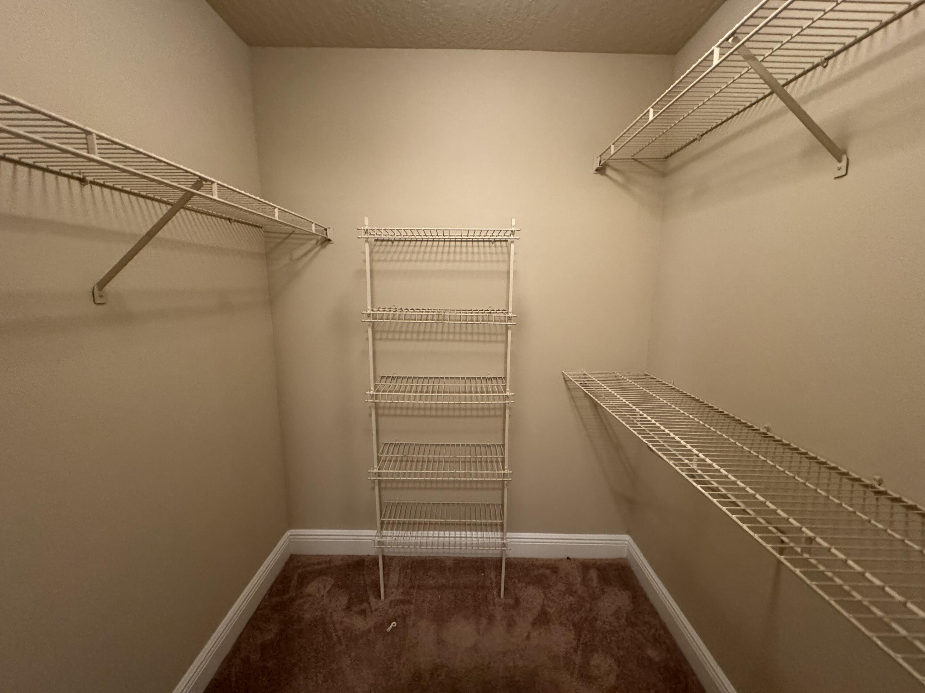 7667 North Wickham Road, Unit 1213 Melbourne, FL 32940 - Photo 5 of 21 bedroom 1 walk in closet