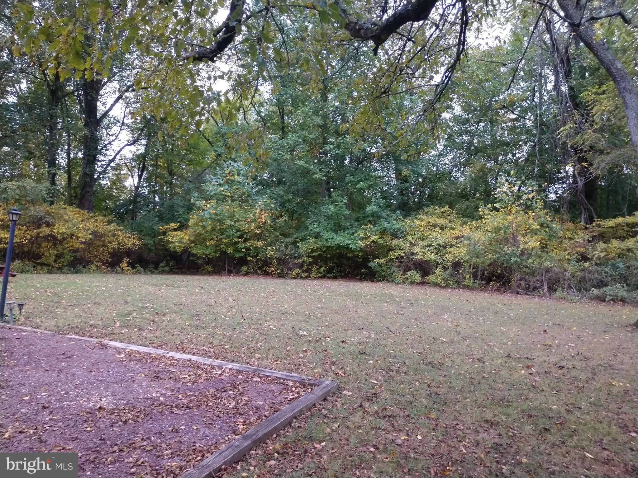 39 Spring Garden Street Lindenwold, NJ 08021 - Photo 5 of 15 Driveway side view of back yard