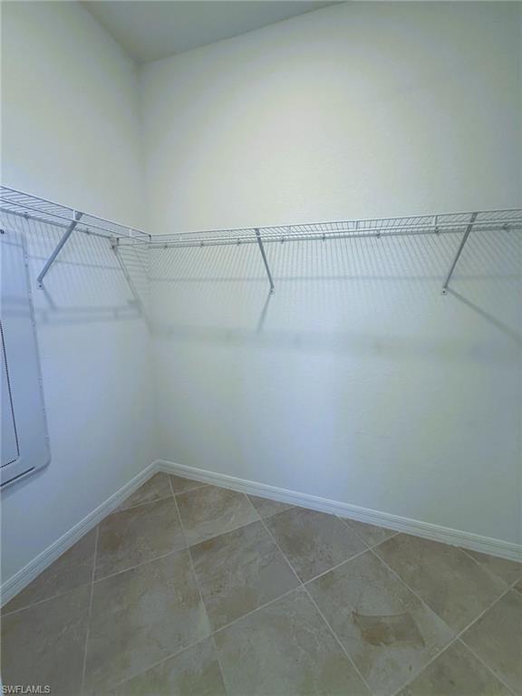 2648 Vine Avenue Naples, FL 34120 - Photo 11 of 20 a view of a room with racks on the wall