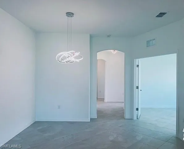 a view of a hallway with closet