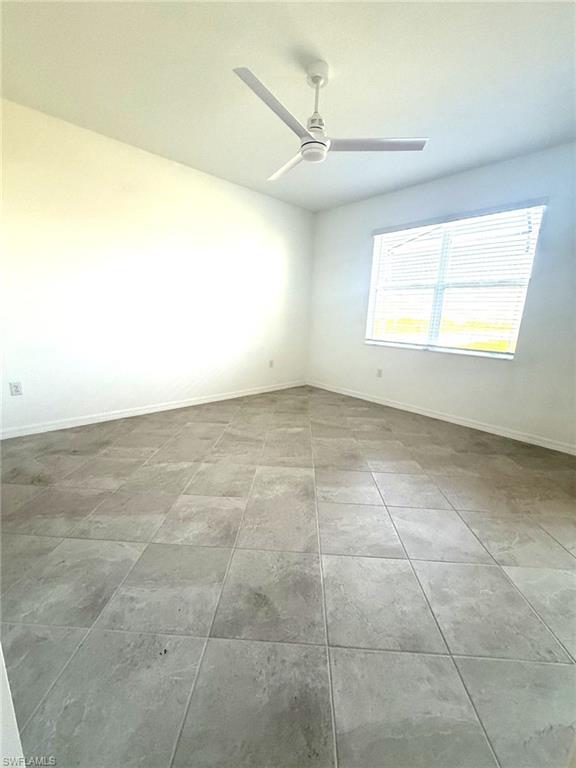 2648 Vine Avenue Naples, FL 34120 - Photo 8 of 20 a view of an empty room and a window