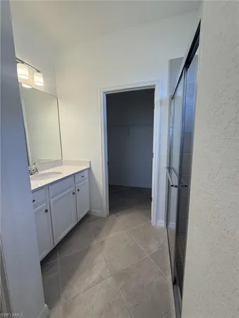 a view of a kitchen from the hallway