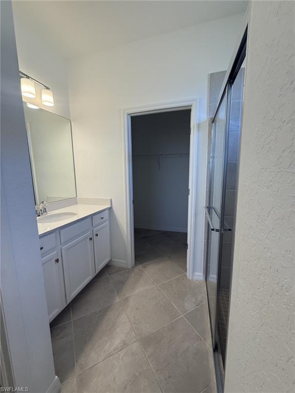 2648 Vine Avenue Naples, FL 34120 - Photo 9 of 20 a view of a kitchen from the hallway