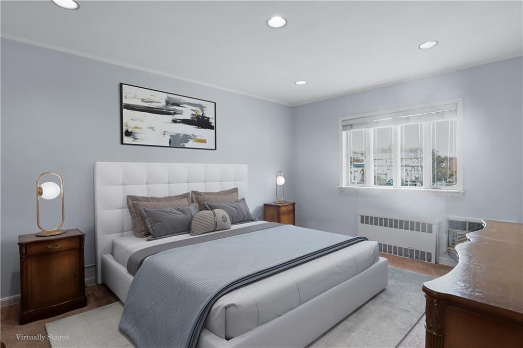 2815 Ave Y Brooklyn, NY 11235 - Photo 11 of 21 a bedroom with bed and a window