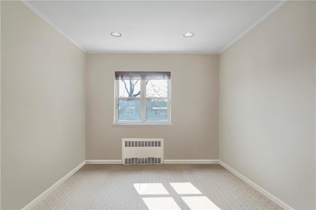 2815 Ave Y Brooklyn, NY 11235 - Photo 14 of 21 an empty room with a window