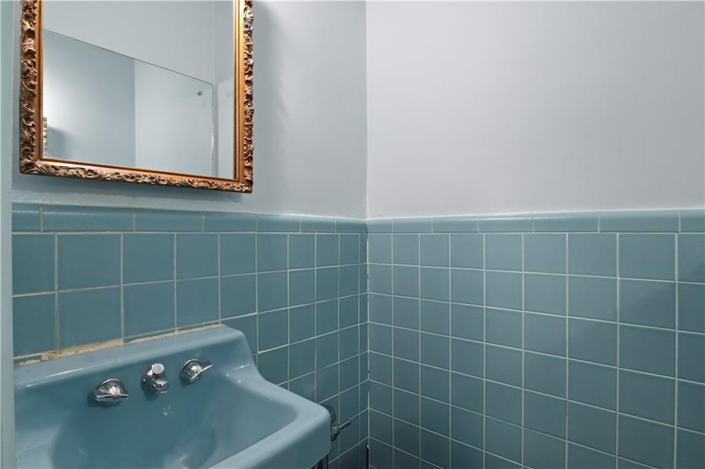 2815 Ave Y Brooklyn, NY 11235 - Photo 10 of 21 a bathroom with a bathtub