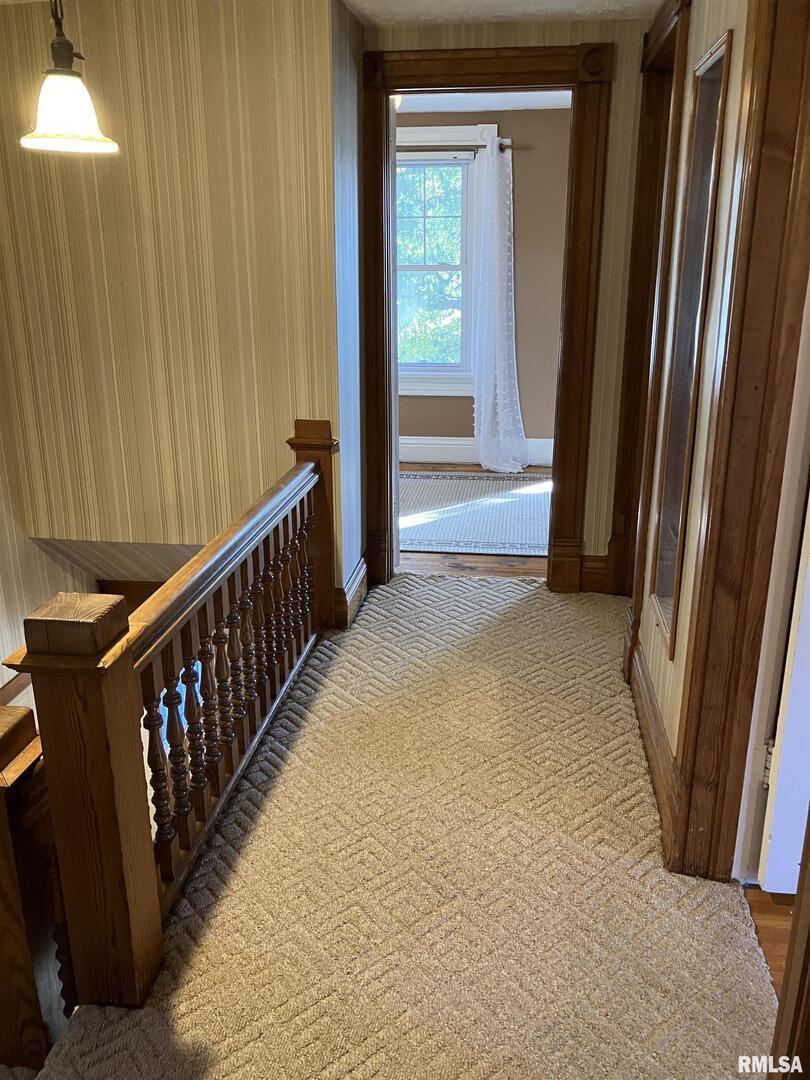 837 Beach Street Kewanee, IL 61443 - Photo 30 of 54 a view of a hallway with windows