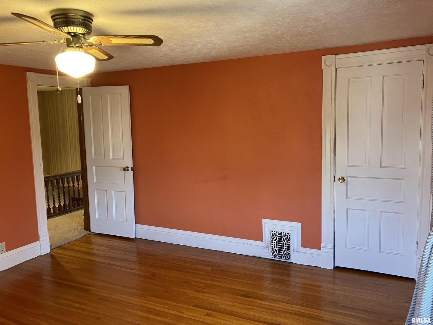 837 Beach Street Kewanee, IL 61443 - Photo 37 of 54 a view of empty room with wooden floor