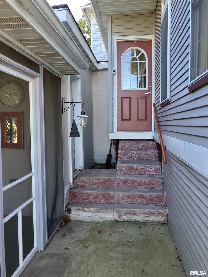 837 Beach Street Kewanee, IL 61443 - Photo 42 of 54 a front view of a house with a stairs