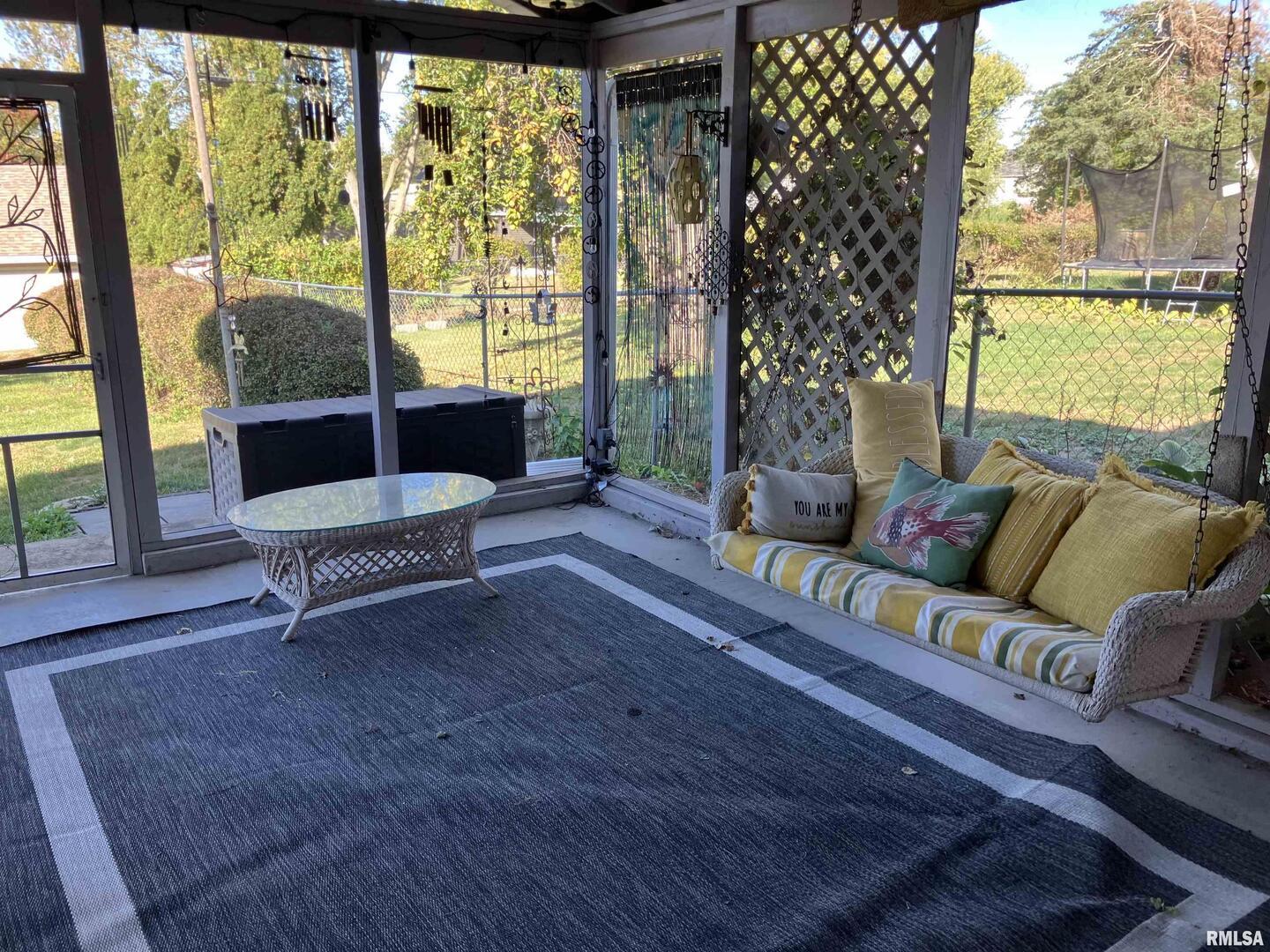 837 Beach Street Kewanee, IL 61443 - Photo 43 of 54 a living room with furniture and a large window