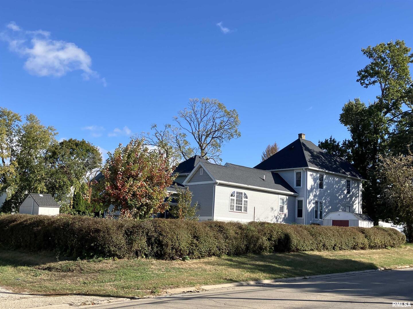837 Beach Street Kewanee, IL 61443 - Photo 53 of 54 a front view of a house with a yard