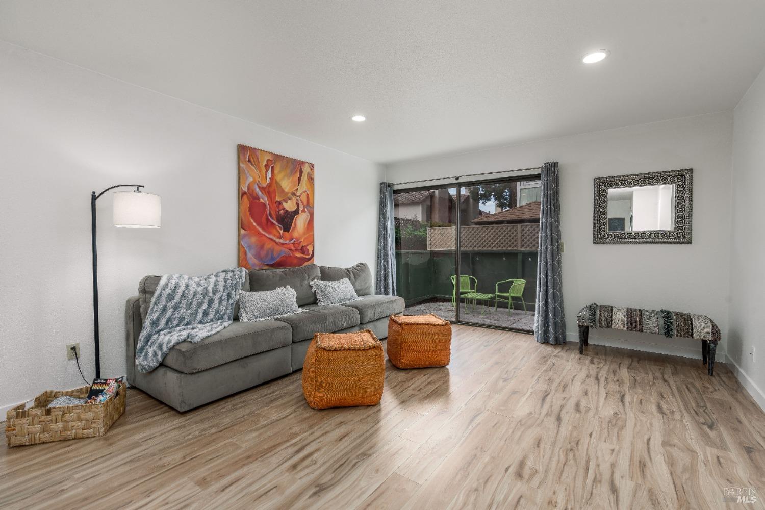 5051 Country Club Drive Rohnert Park, CA 94928 - Photo 1 of 1 a living room with furniture and a wooden floor