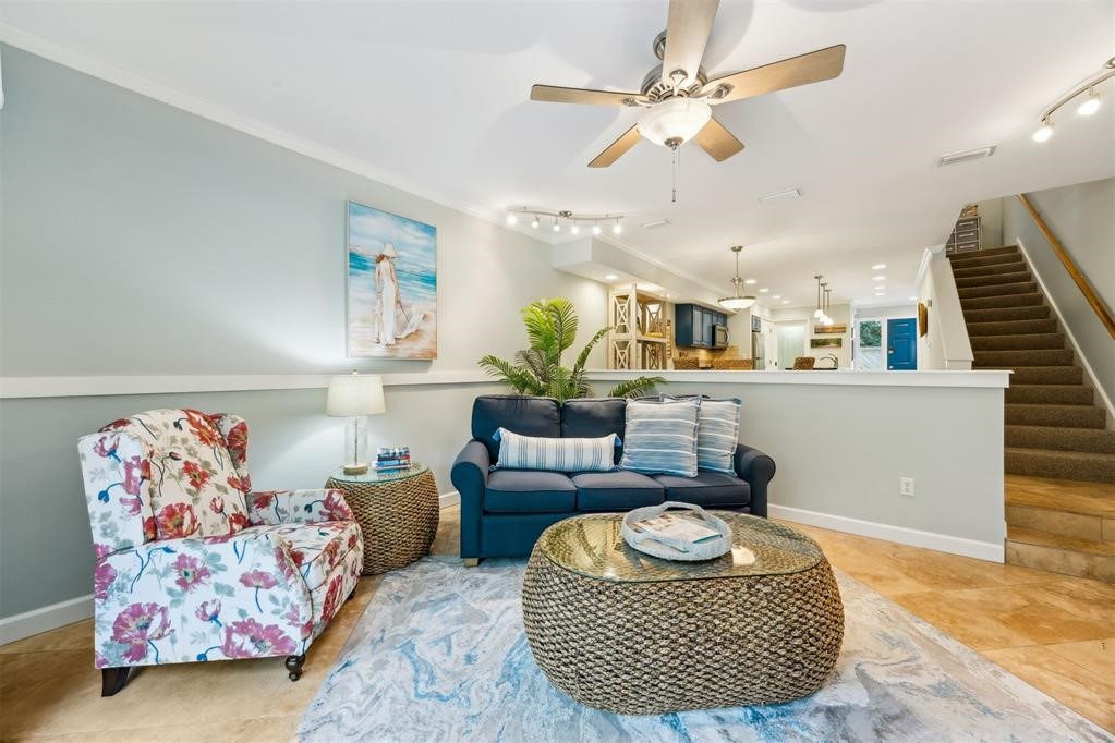 3033 Sea Marsh Road Fernandina Beach, FL 32034 - Photo 17 of 37 a living room with furniture and a rug