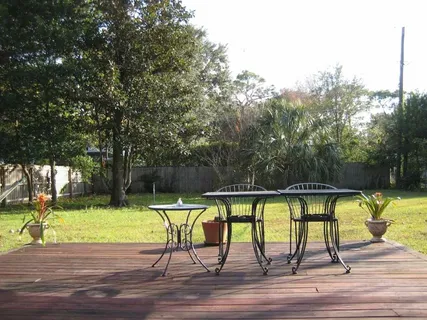 a view of swimming pool with a backyard