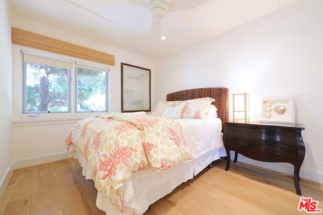 31008 Broad Beach Road Malibu, CA 90265 - Photo 26 of 40 a bedroom with a bed and window