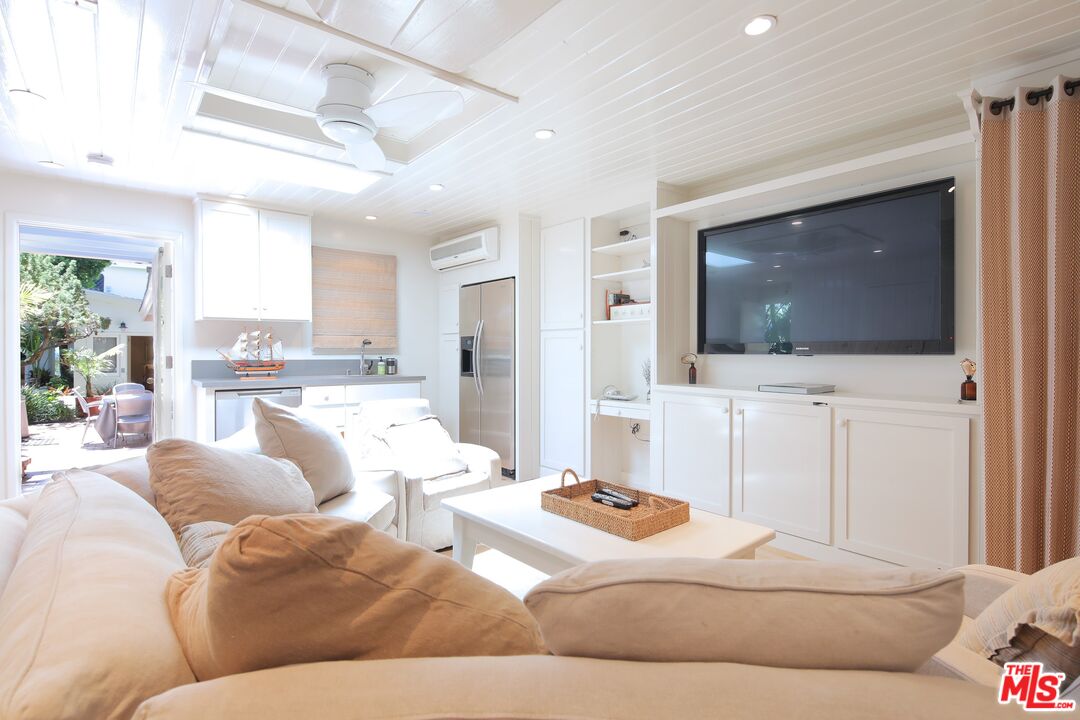 31008 Broad Beach Road Malibu, CA 90265 - Photo 35 of 40 a living room with furniture and a flat screen tv