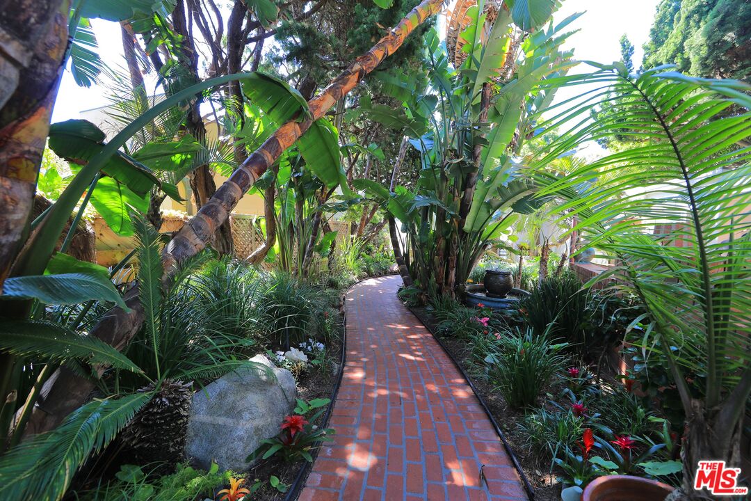 31008 Broad Beach Road Malibu, CA 90265 - Photo 9 of 40 a view of a pathway both side of yard