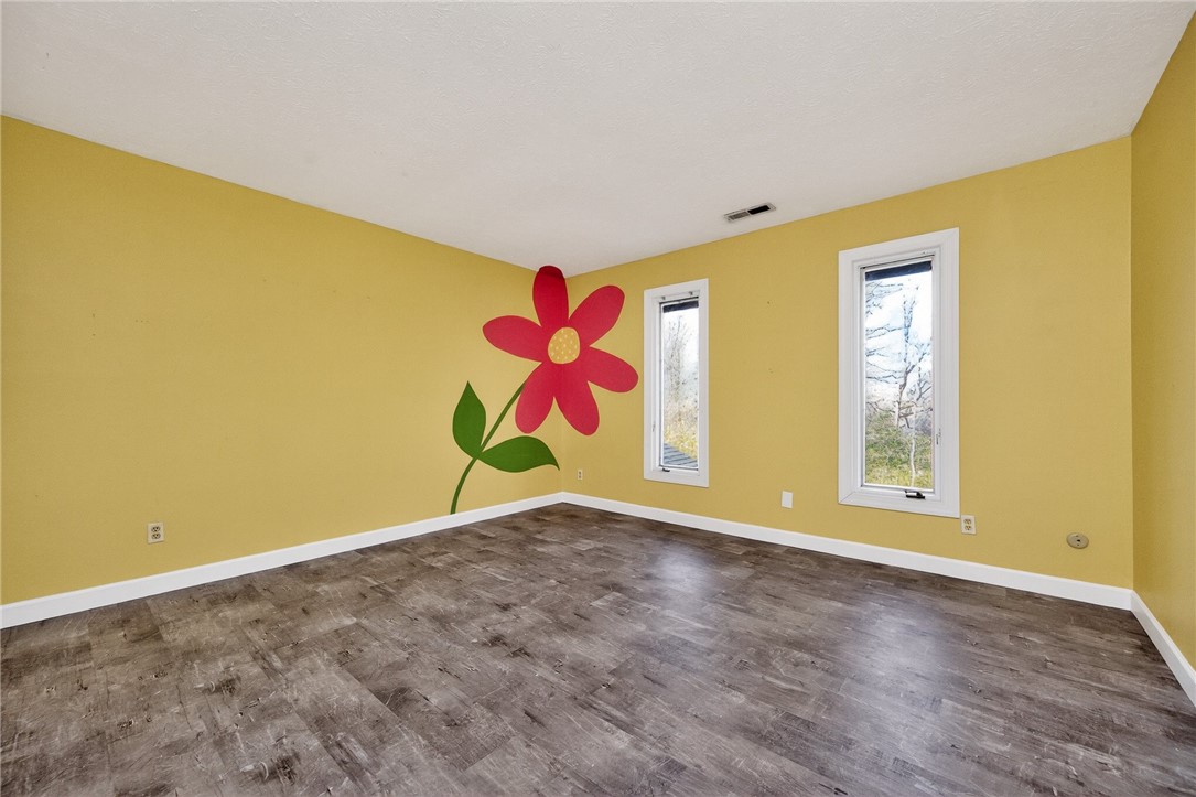 4747 Fawnwood Road Dayton, OH 45429 - Photo 44 of 58 This cheerful room features durable flooring and ample natural light, creating a bright and inviting atmosphere.