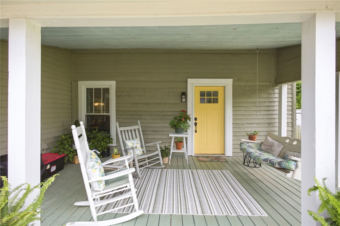 314 South Fairplay Street Seneca, SC 29678 - Photo 4 of 50 This charming porch provides a serene outdoor living space perfect for relaxation.