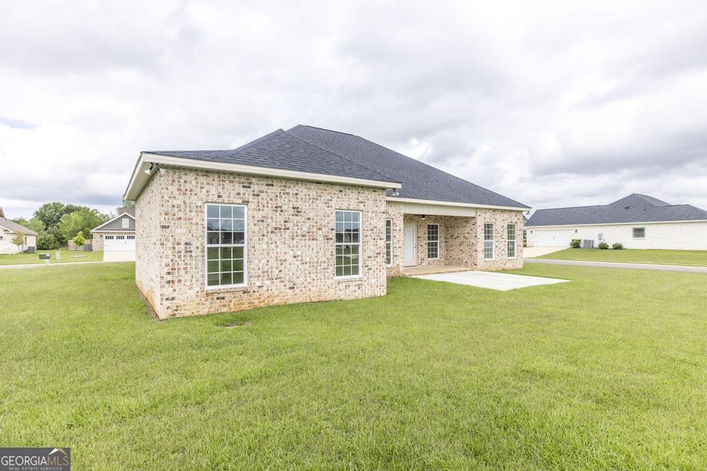 224 Otters Rdg Drive Kathleen, GA 31047 - Photo 28 of 31 a view of a house with a yard