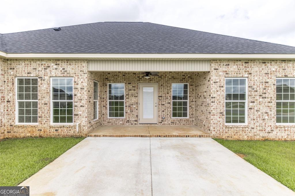 224 Otters Rdg Drive Kathleen, GA 31047 - Photo 29 of 31 front view of a house with a yard