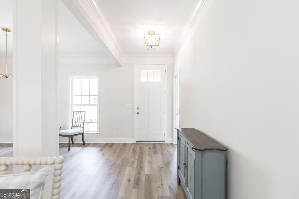 224 Otters Rdg Drive Kathleen, GA 31047 - Photo 5 of 31 a view of livingroom with hardwood floor and hallway