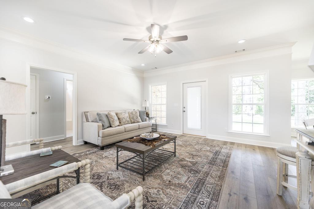224 Otters Rdg Drive Kathleen, GA 31047 - Photo 8 of 31 a living room with furniture and a large window