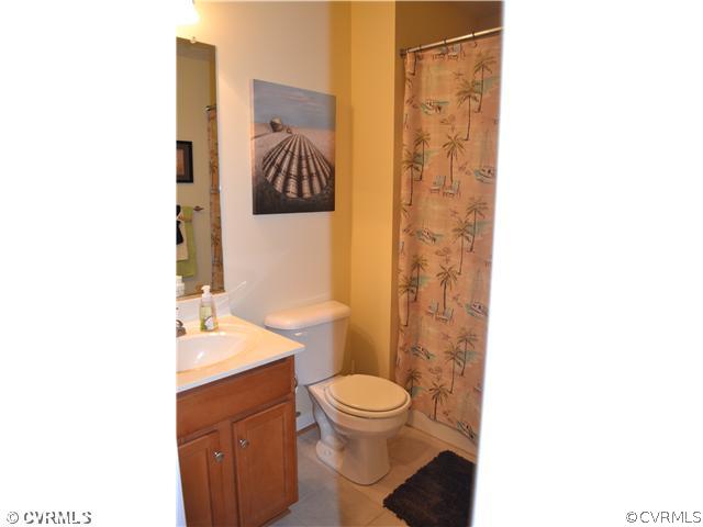 3131 Quaker Road Quinton, VA 23141 - Photo 14 of 17 a bathroom with a toilet and a shower