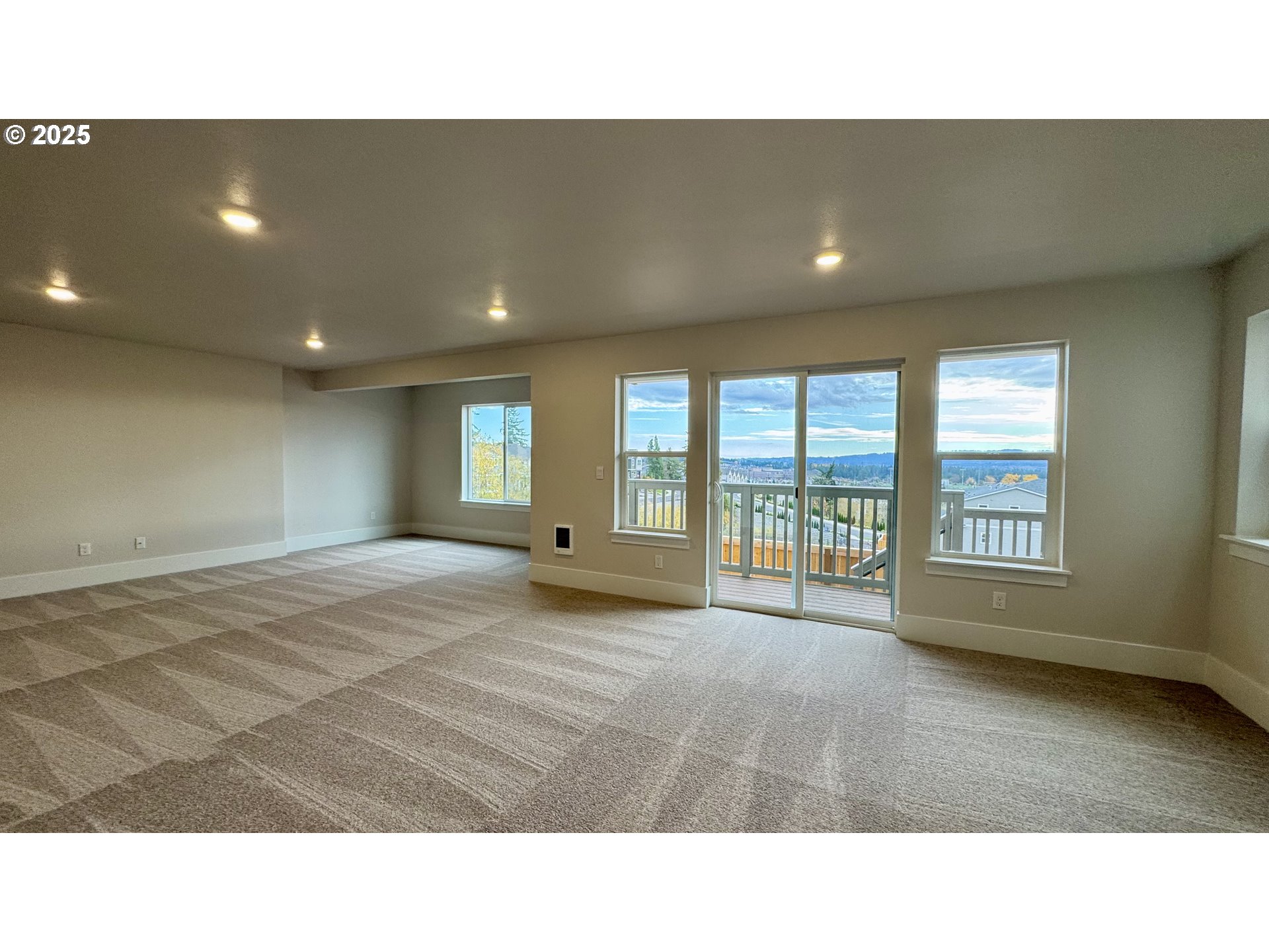 17614 Southwest Watchman Lane Beaverton, OR 97007 - Photo 27 of 36 a living room with a large window