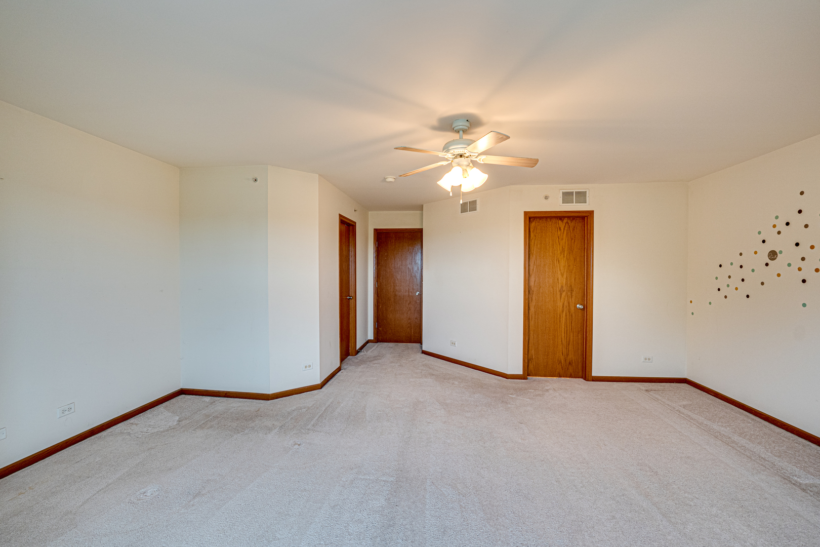 3904 Preston Drive Yorkville, IL 60560 - Photo 20 of 25 a view of an empty room with a chandelier fan