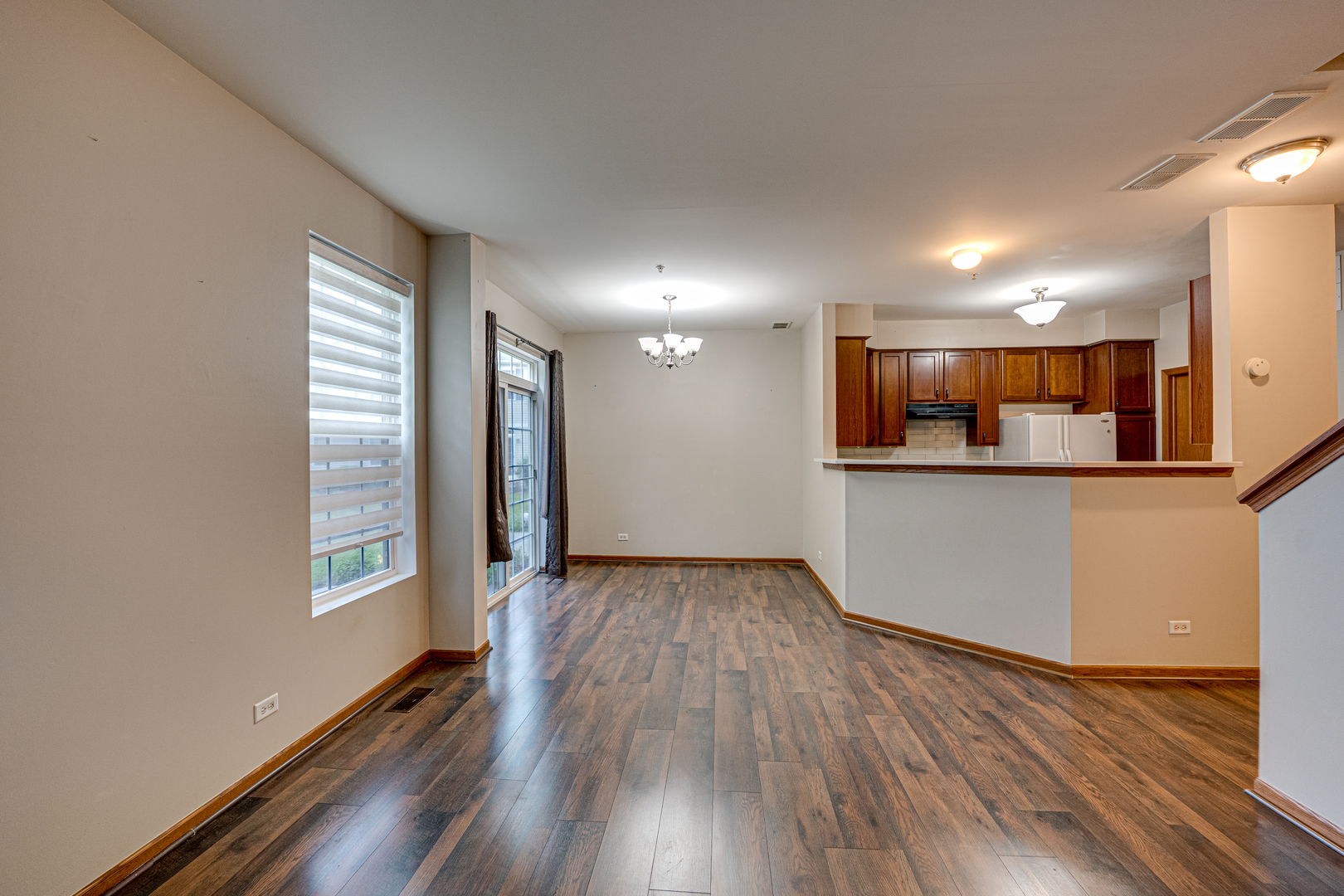 3904 Preston Drive Yorkville, IL 60560 - Photo 4 of 25 a view of a kitchen with a dishwasher and wooden floor