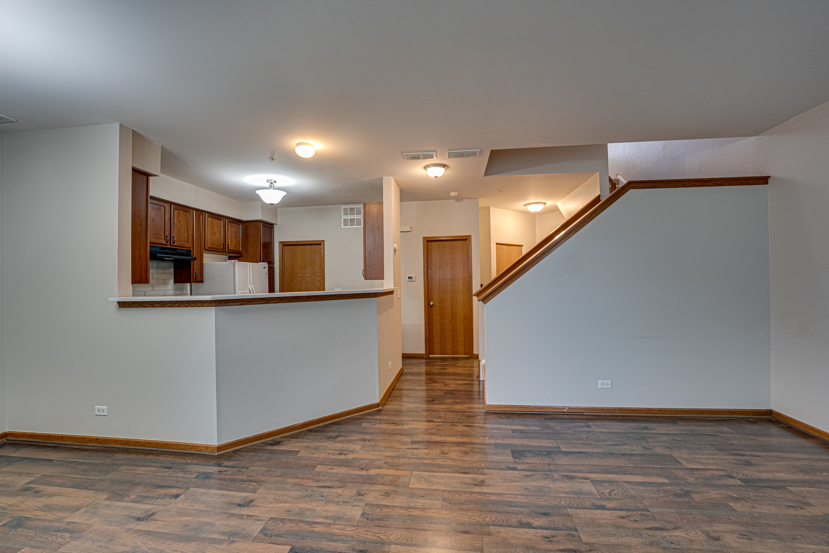 3904 Preston Drive Yorkville, IL 60560 - Photo 6 of 25 a view of an empty room with wooden floor