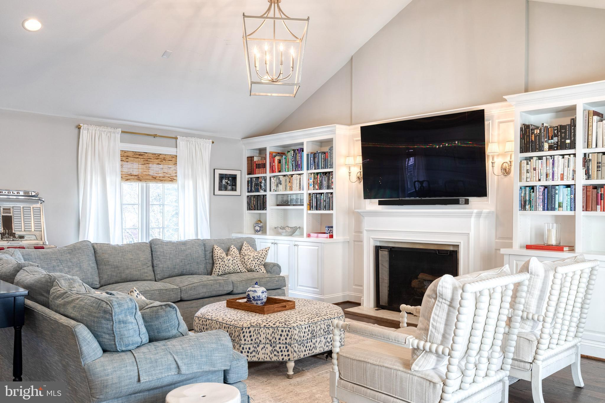 1808 Circle Road Baltimore, MD 21204 - Photo 12 of 64 a living room with furniture a fireplace and a flat screen tv
