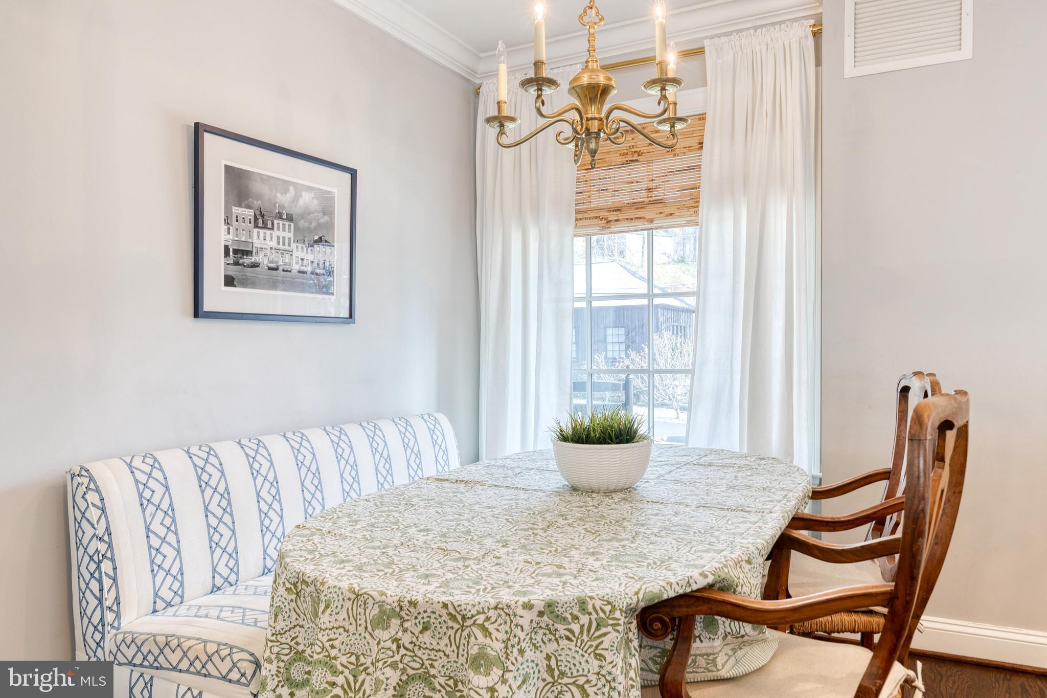 1808 Circle Road Baltimore, MD 21204 - Photo 19 of 64 a view of a dining room with furniture and wooden floor