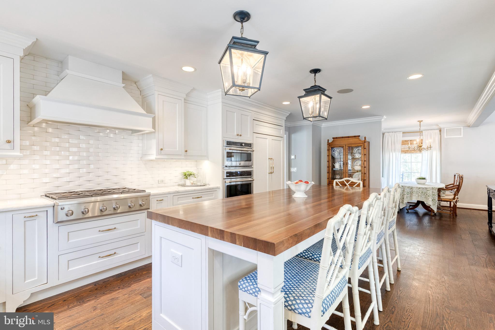 1808 Circle Road Baltimore, MD 21204 - Photo 25 of 64 an open kitchen with a table and chairs in it