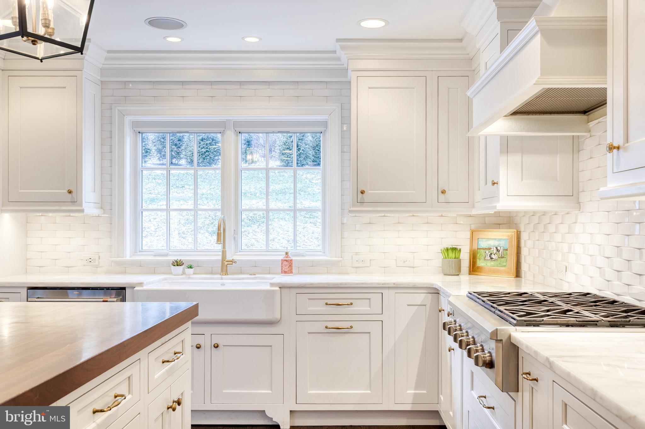 1808 Circle Road Baltimore, MD 21204 - Photo 27 of 64 a kitchen with granite countertop white cabinets and a stove
