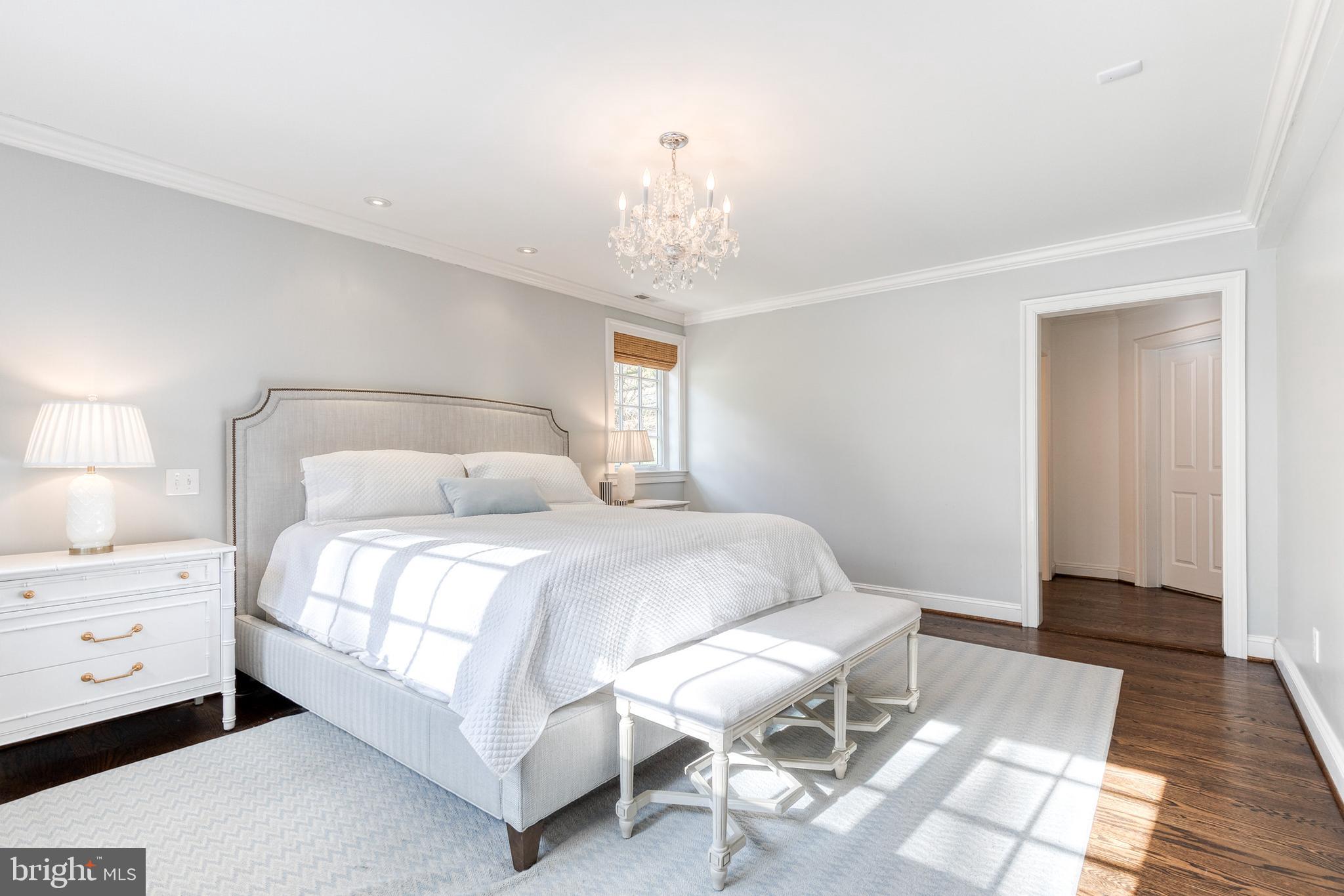 1808 Circle Road Baltimore, MD 21204 - Photo 33 of 64 a bedroom with a bed and a chandelier