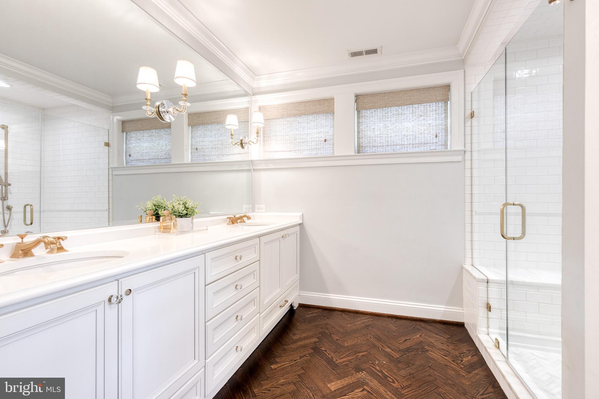 1808 Circle Road Baltimore, MD 21204 - Photo 36 of 64 a bathroom with a sink a mirror and a shower