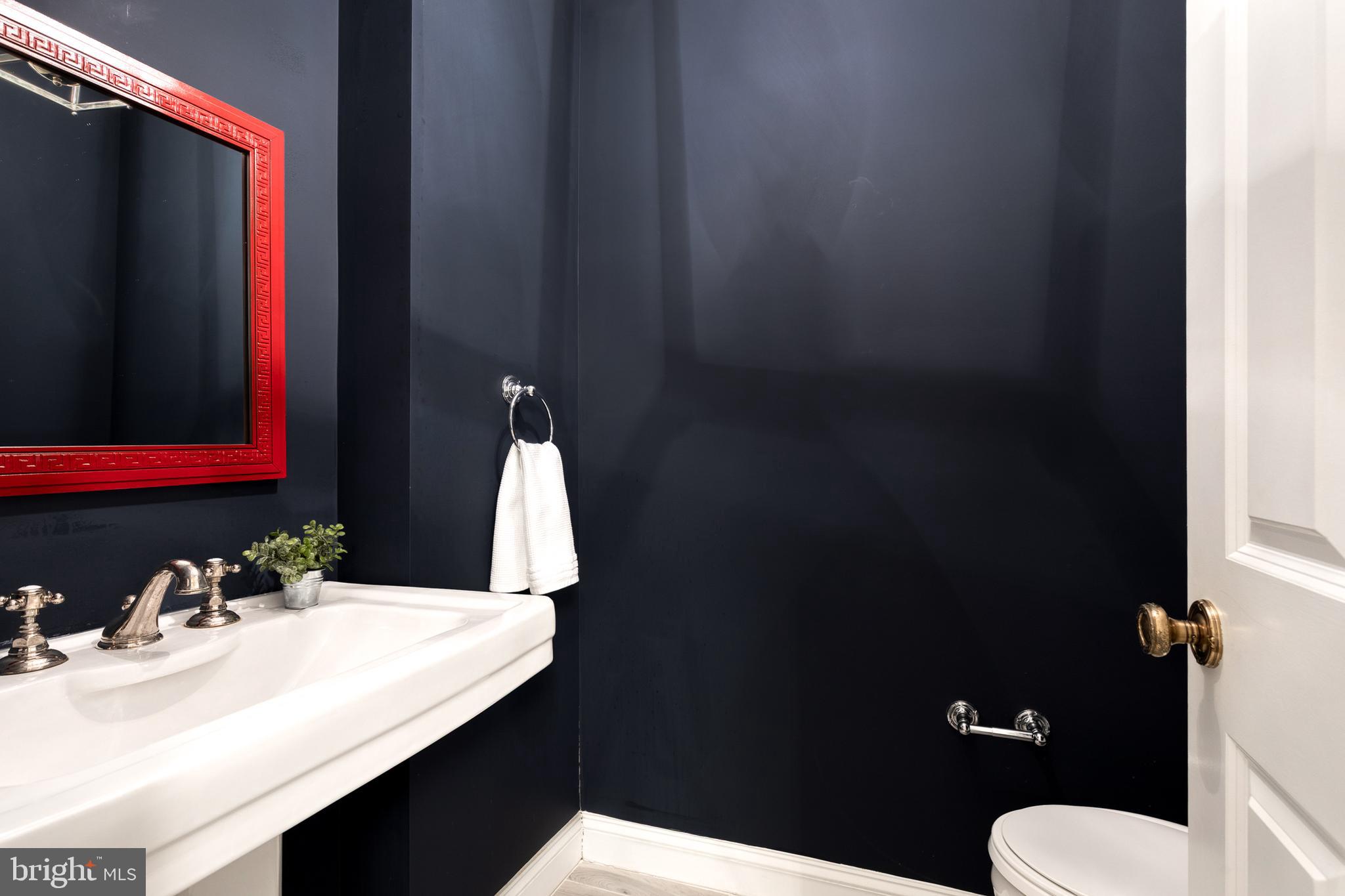 1808 Circle Road Baltimore, MD 21204 - Photo 41 of 64 a bathroom with a sink vanity mirror and toilet