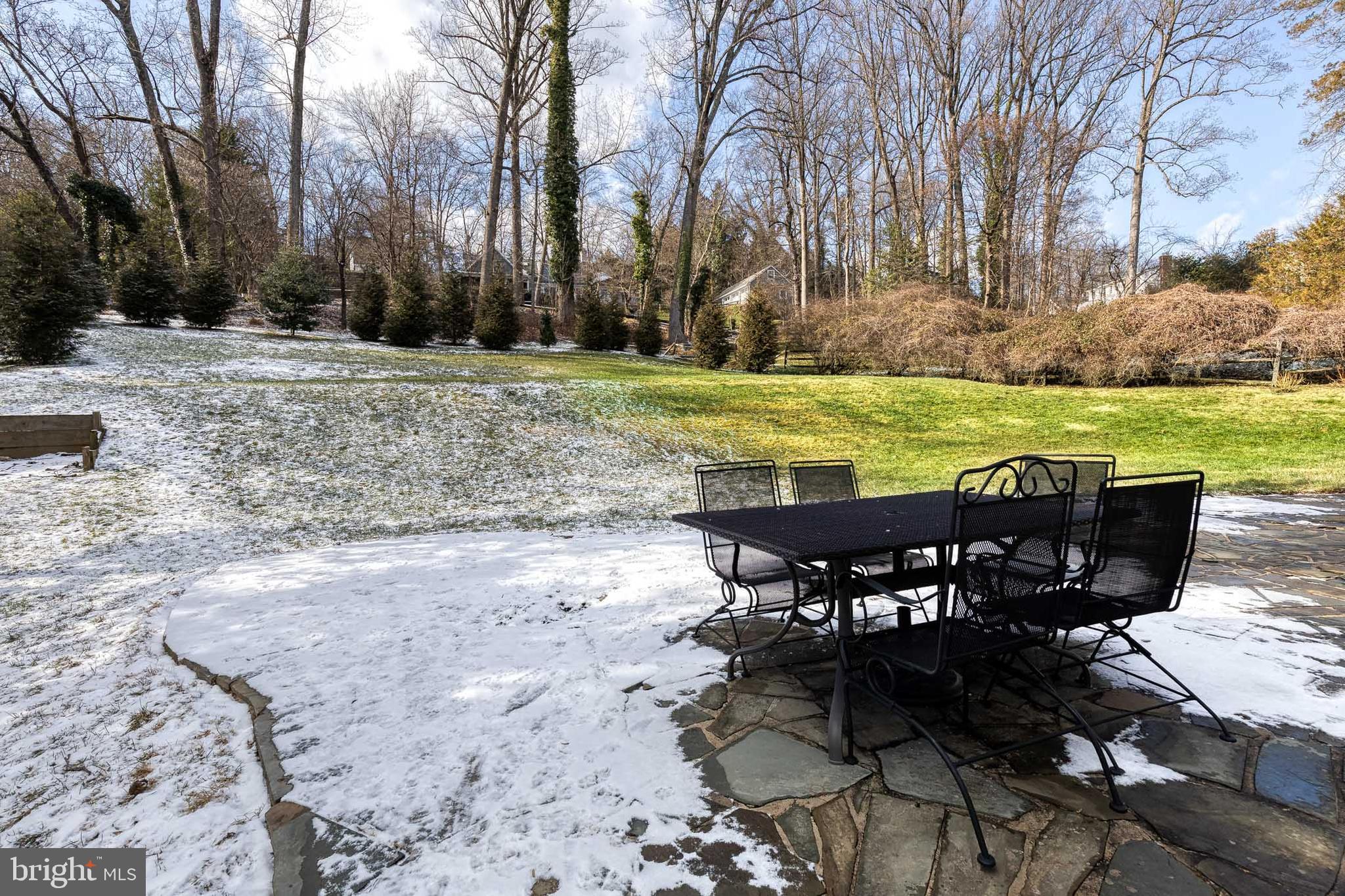 1808 Circle Road Baltimore, MD 21204 - Photo 55 of 64 a view of a patio with table and chairs under an umbrella