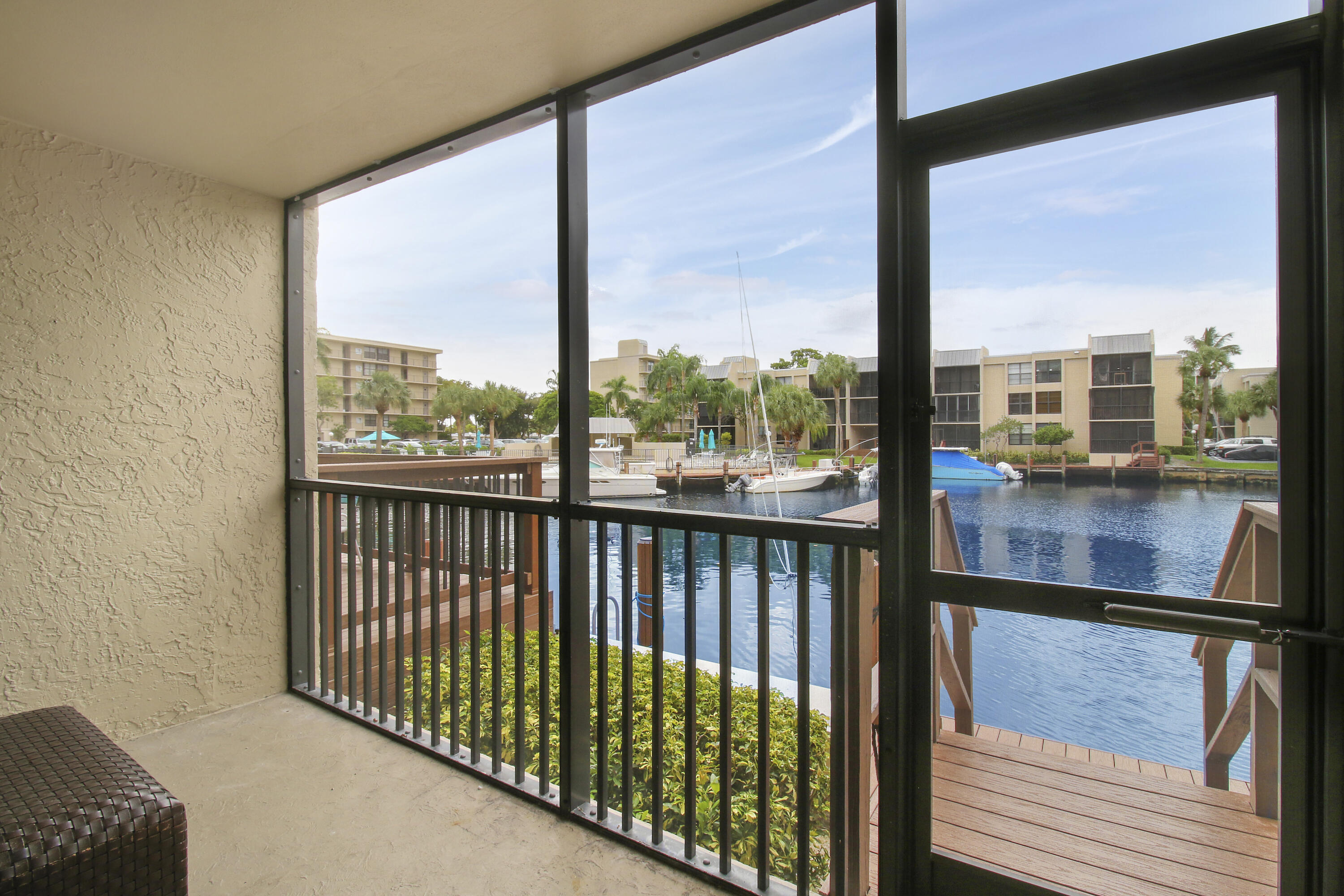 9 Royal Palm Way, Unit 105 Boca Raton, FL 33432 - Photo 17 of 26 a view of a glass door from a balcony