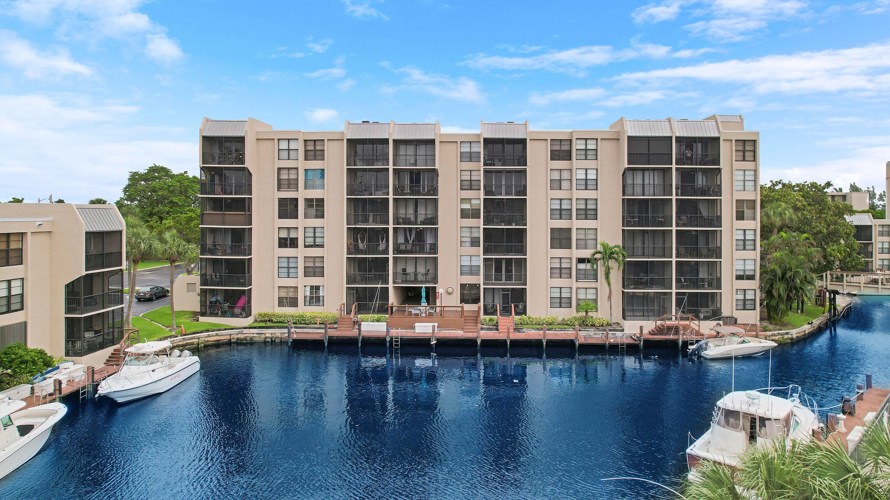 9 Royal Palm Way, Unit 105 Boca Raton, FL 33432 - Photo 22 of 26 a view of a building with lake view