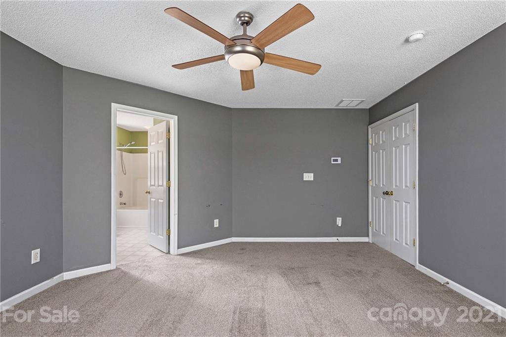 521 Red Oak Court Tega Cay, SC 29708 - Photo 16 of 23 a view of an empty room and window
