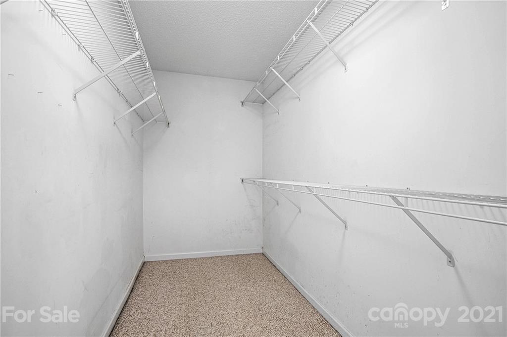 521 Red Oak Court Tega Cay, SC 29708 - Photo 17 of 23 a view of small space with racks on the wall